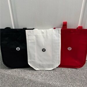 lululemon athletica Black, White, and Red Tote Bags